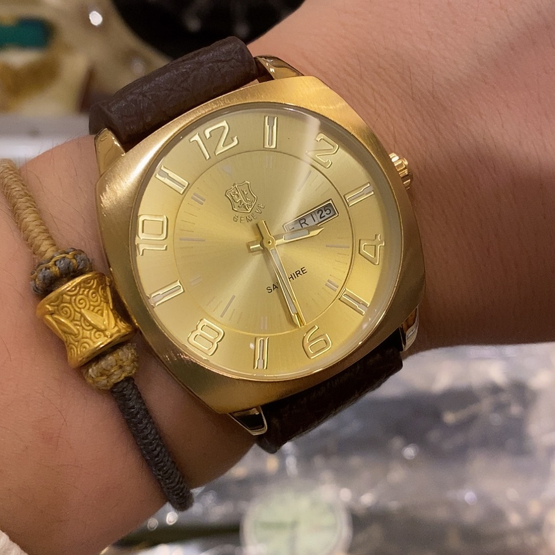 精钢日内瓦金色印记腕表