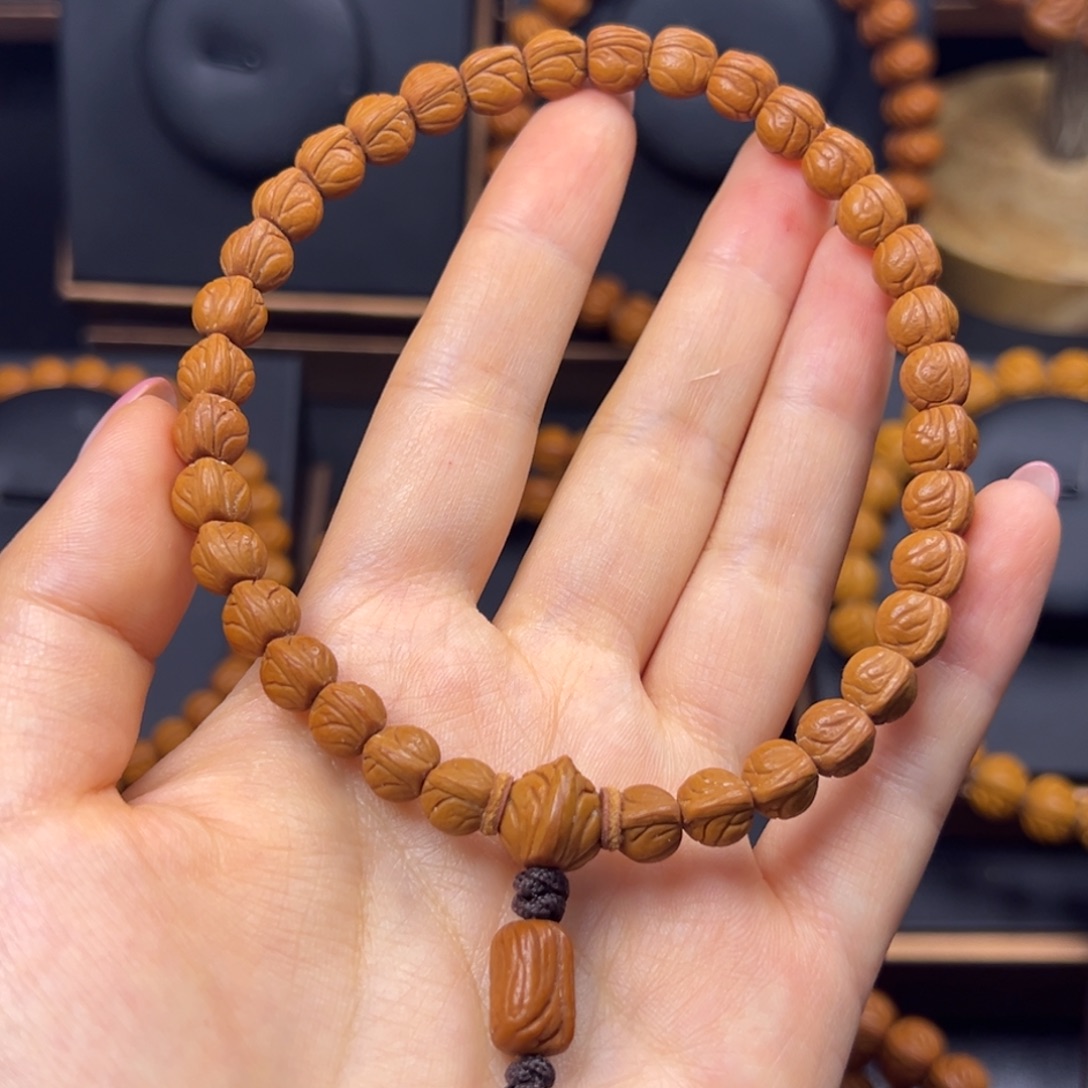 来****桃核手串野生玉龙脊0.8