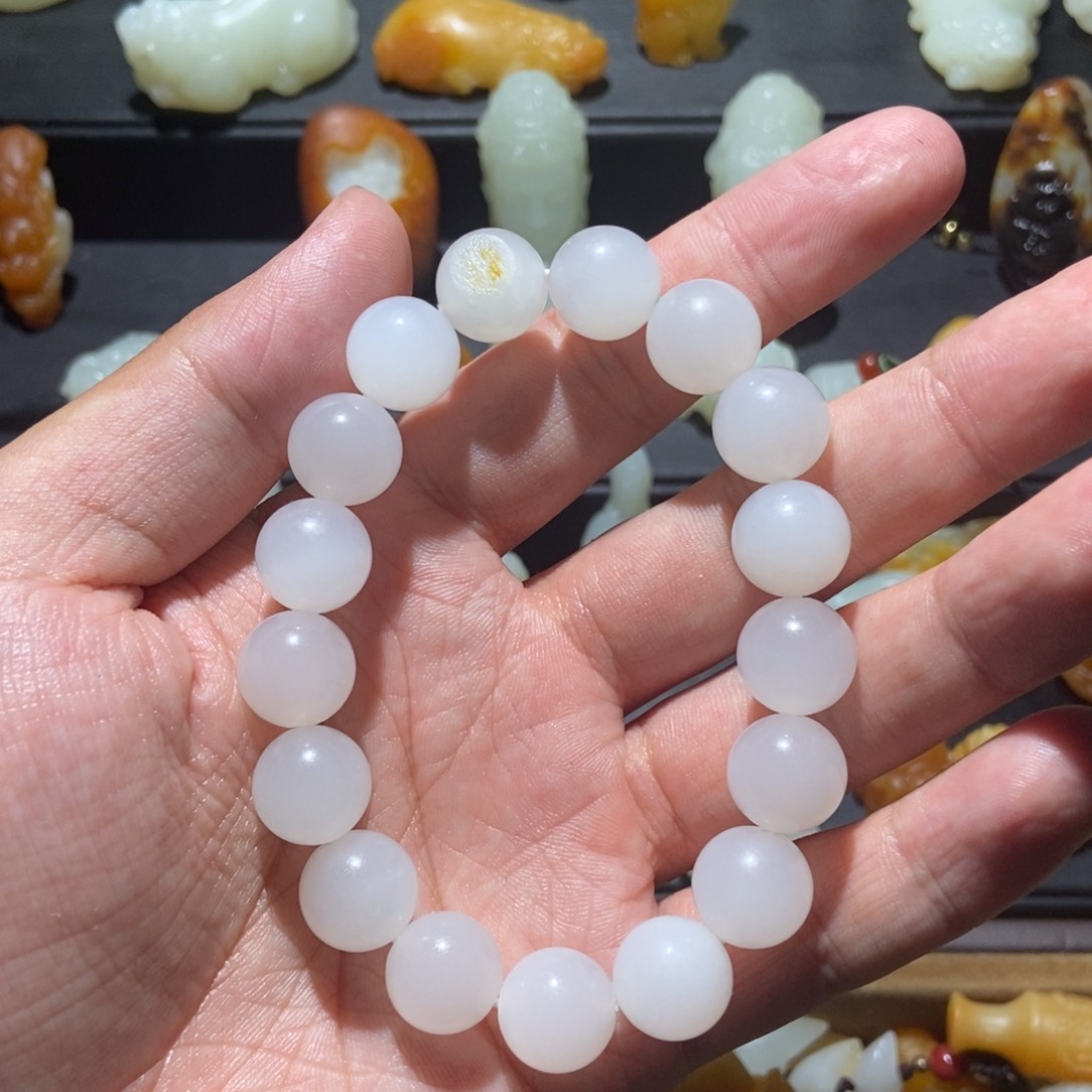 珍***）和田玉未镶嵌颈饰