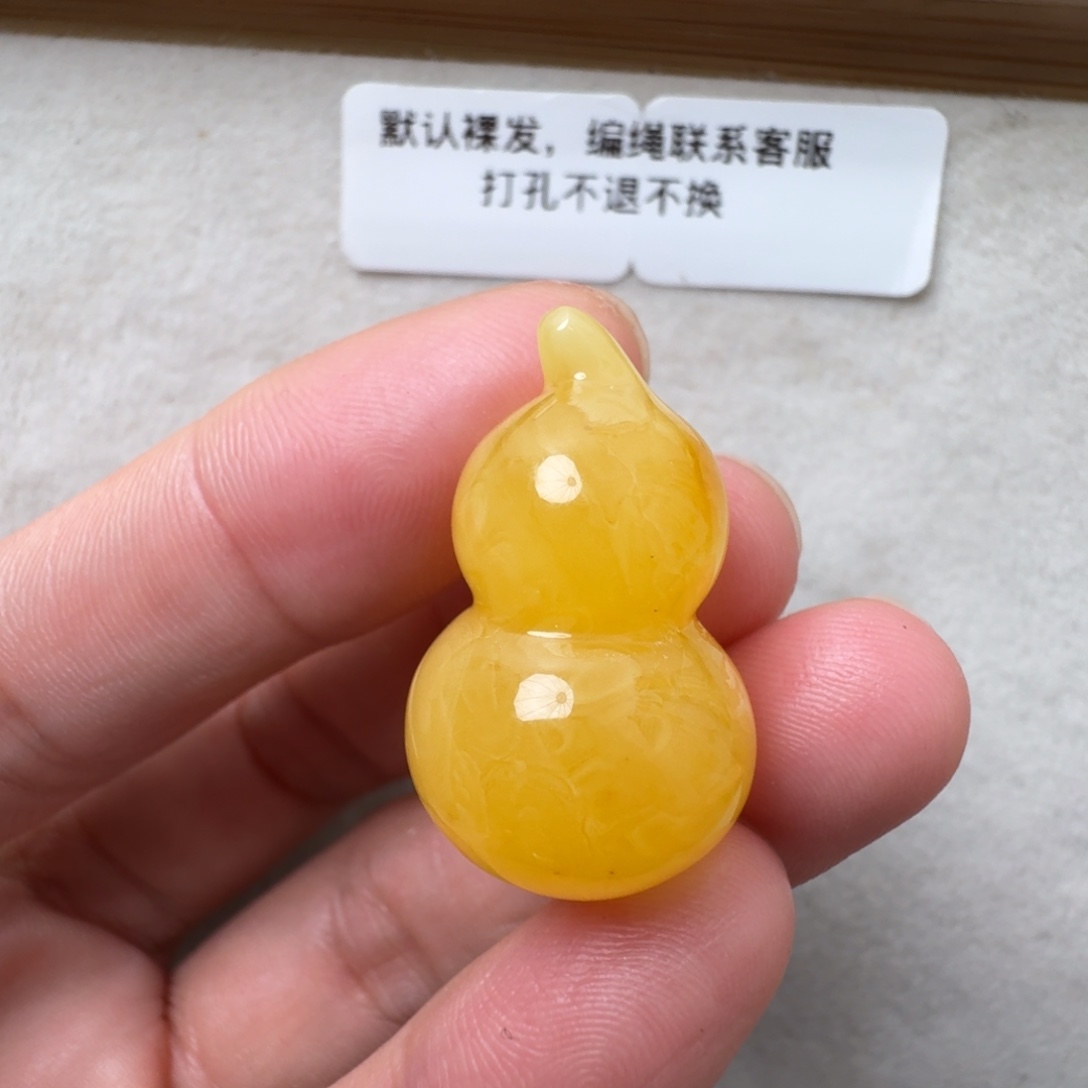 蜜蜡未镶嵌珠宝奇石超过七天不退不换，有瑕疵