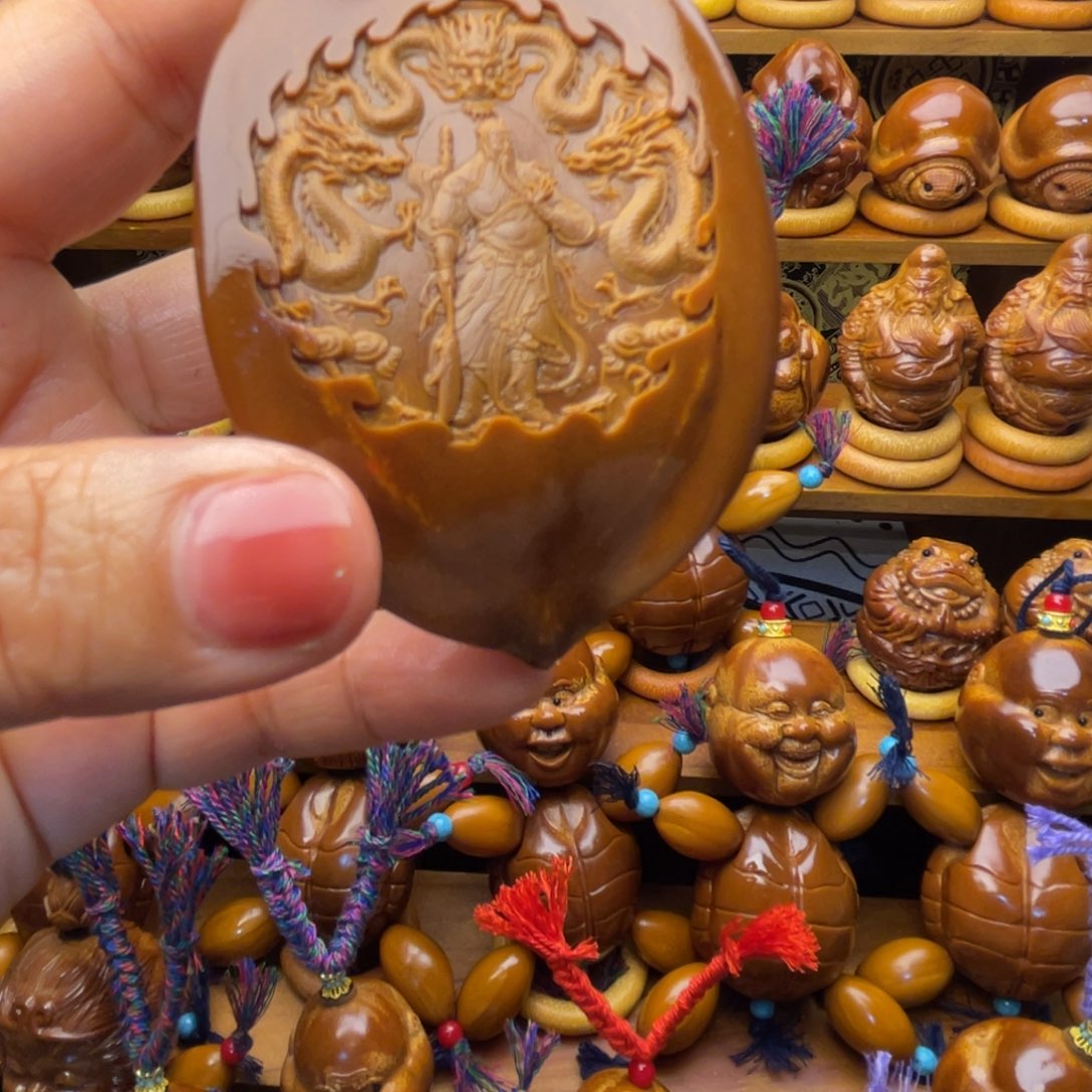 点***家橄榄核吊坠大三角核