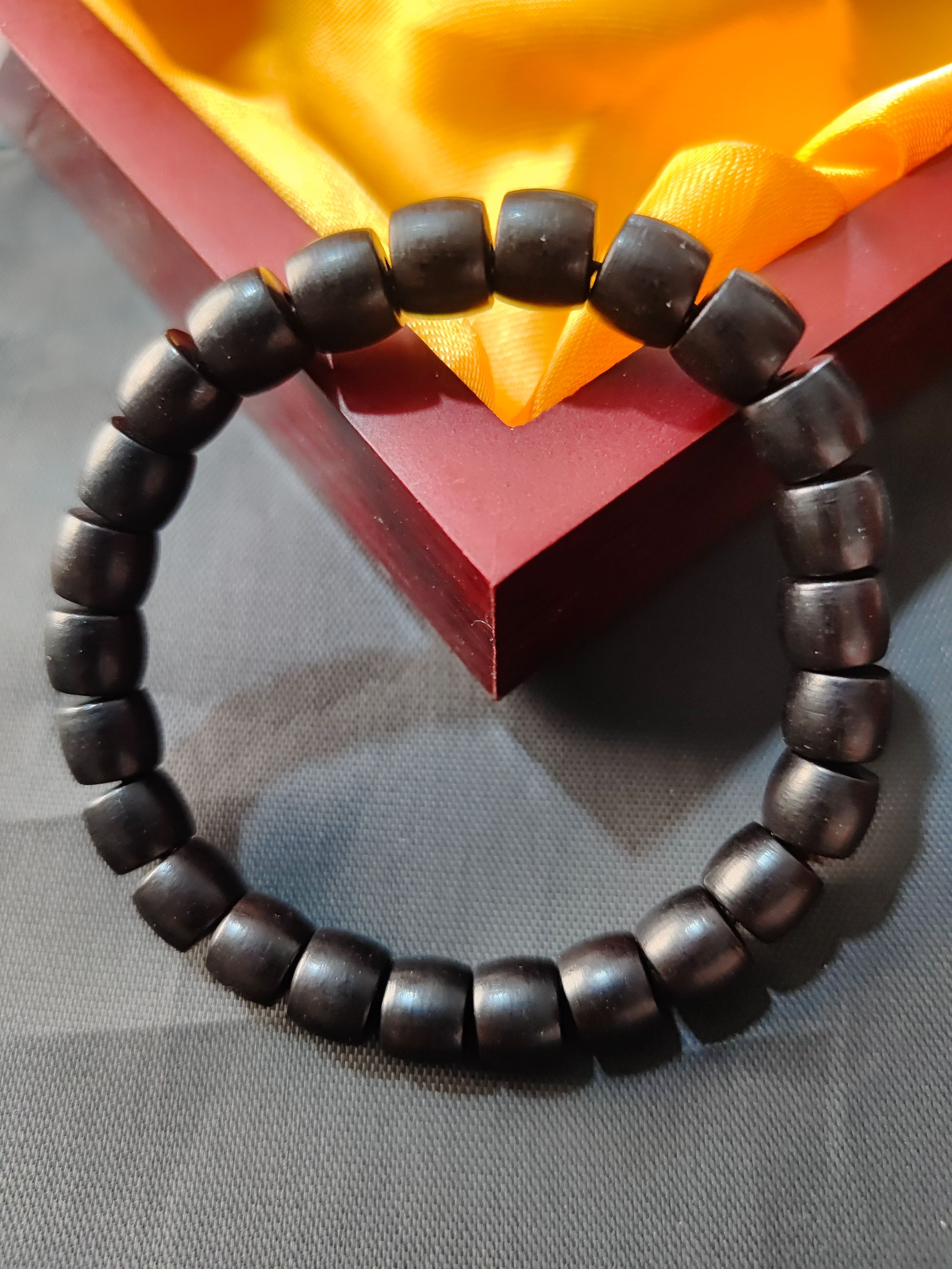 035天然原木黑檀桶珠单圈手串