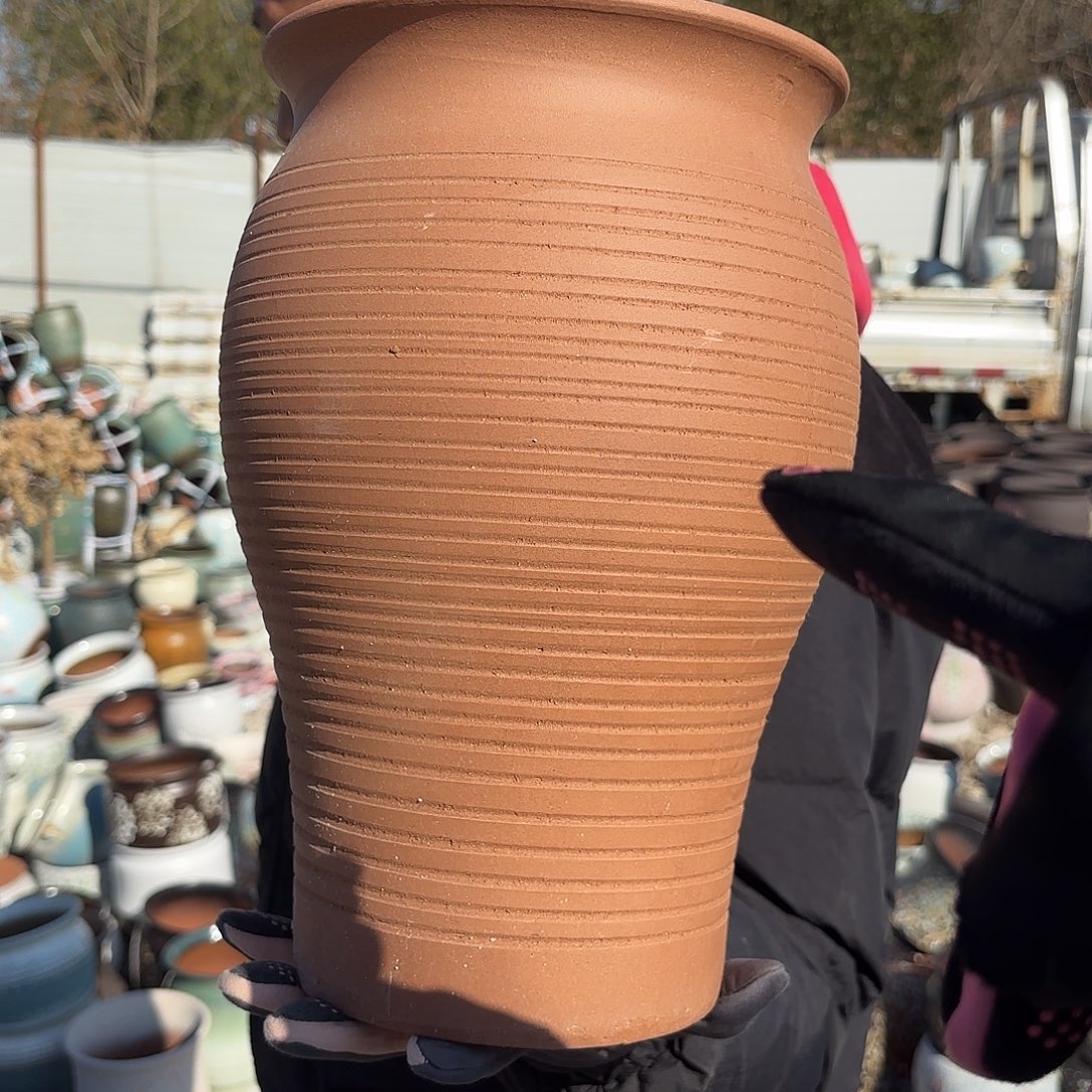 红陶鱼尾一个口径20高度31