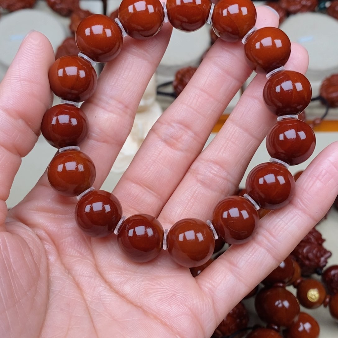 橄榄核吊坠不*负光珠，