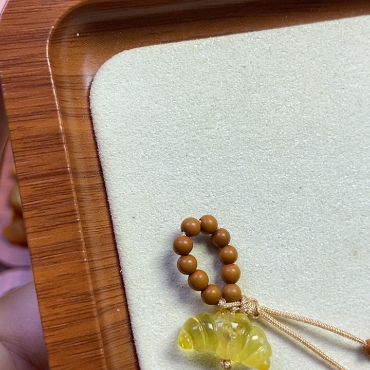 琥珀未镶嵌珠宝奇石牛角包提溜