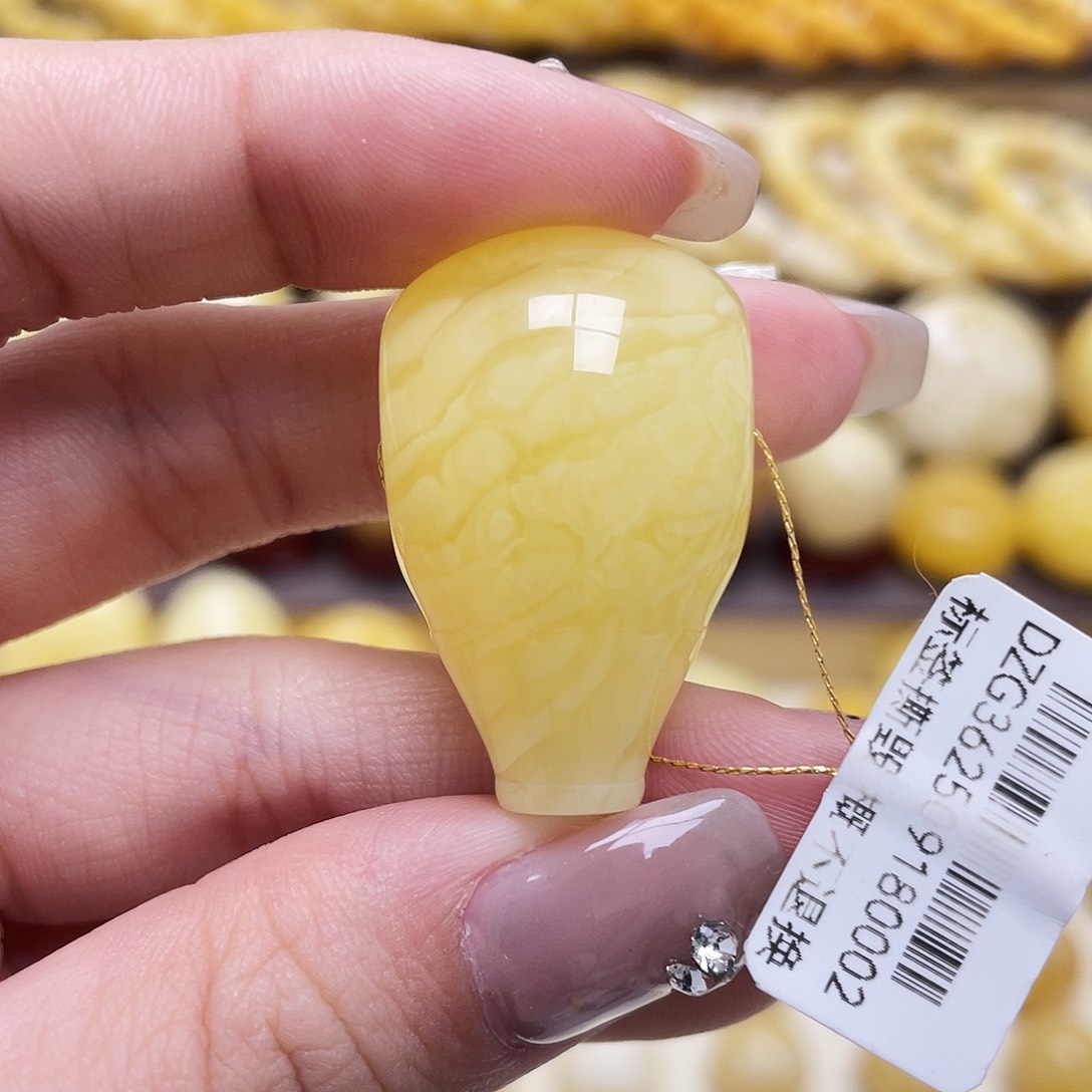 海***子琥珀未镶嵌裸石20*31.9mm三通