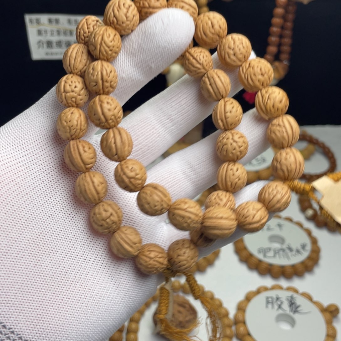 桃核手串墨*12+大肠纹金豆