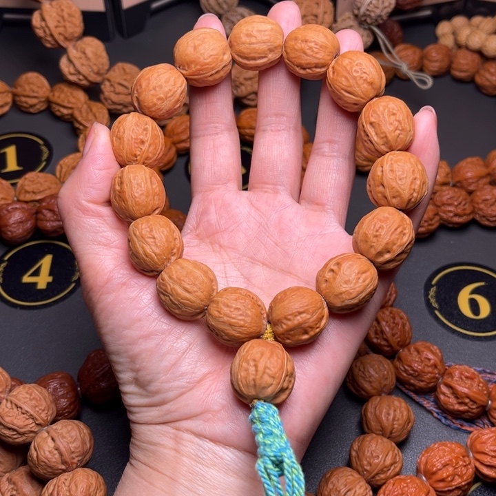 牛***包文玩核桃手串光头