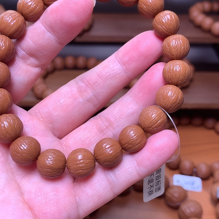 伊****核桃12同尺聚宝盆手串