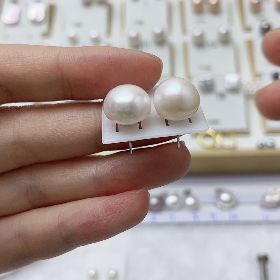 谁***疯银S925镶嵌耳饰淡水珍珠