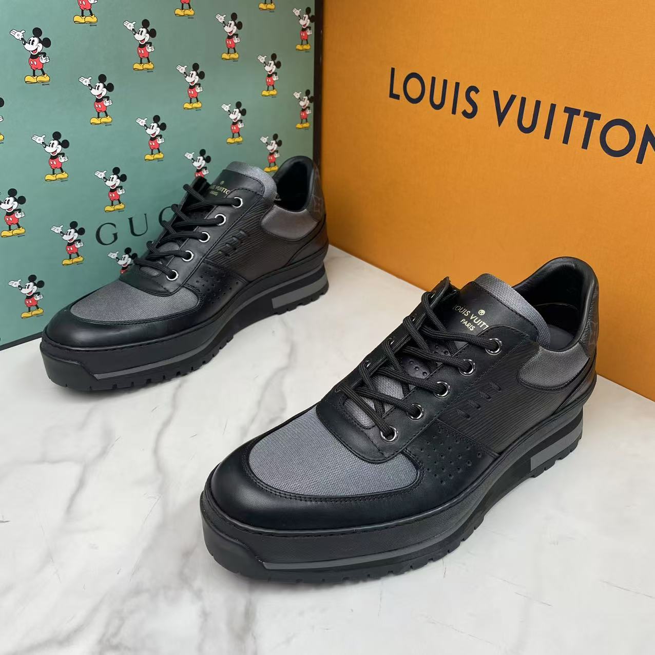 99新 LouisVuitton/路易威登 黑灰皮面潮流百搭运动鞋/39.5码