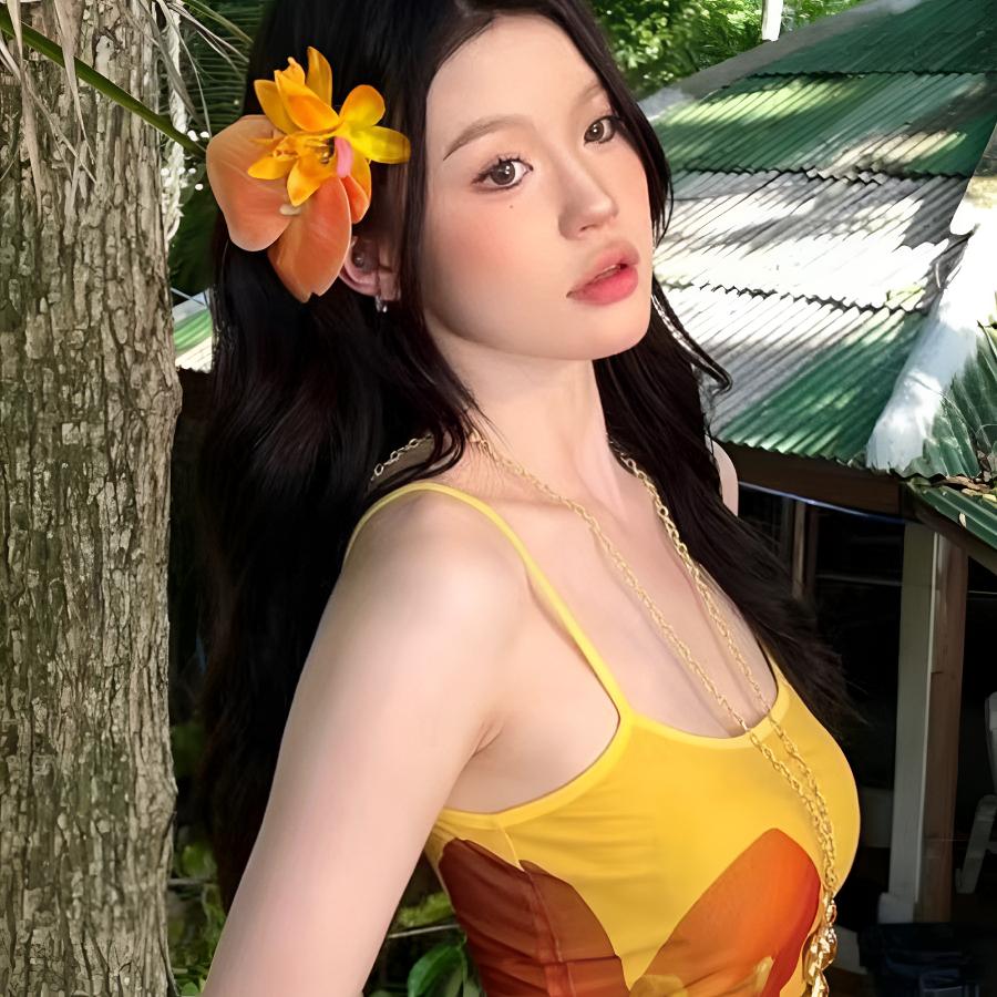 辣妹穿搭桔黄色花朵发饰蝴蝶兰头花发夹度假拍照氛围感头饰发卡子