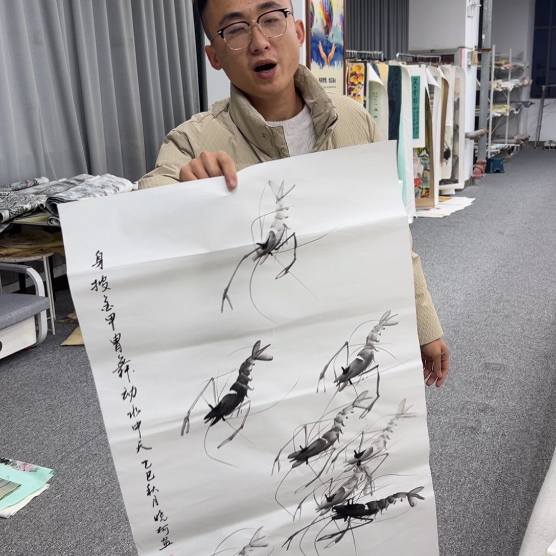 国画卖字画的小男孩