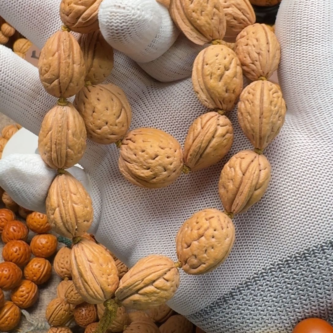 王***贵桃核吊坠奶油核钱袋子20颗手持