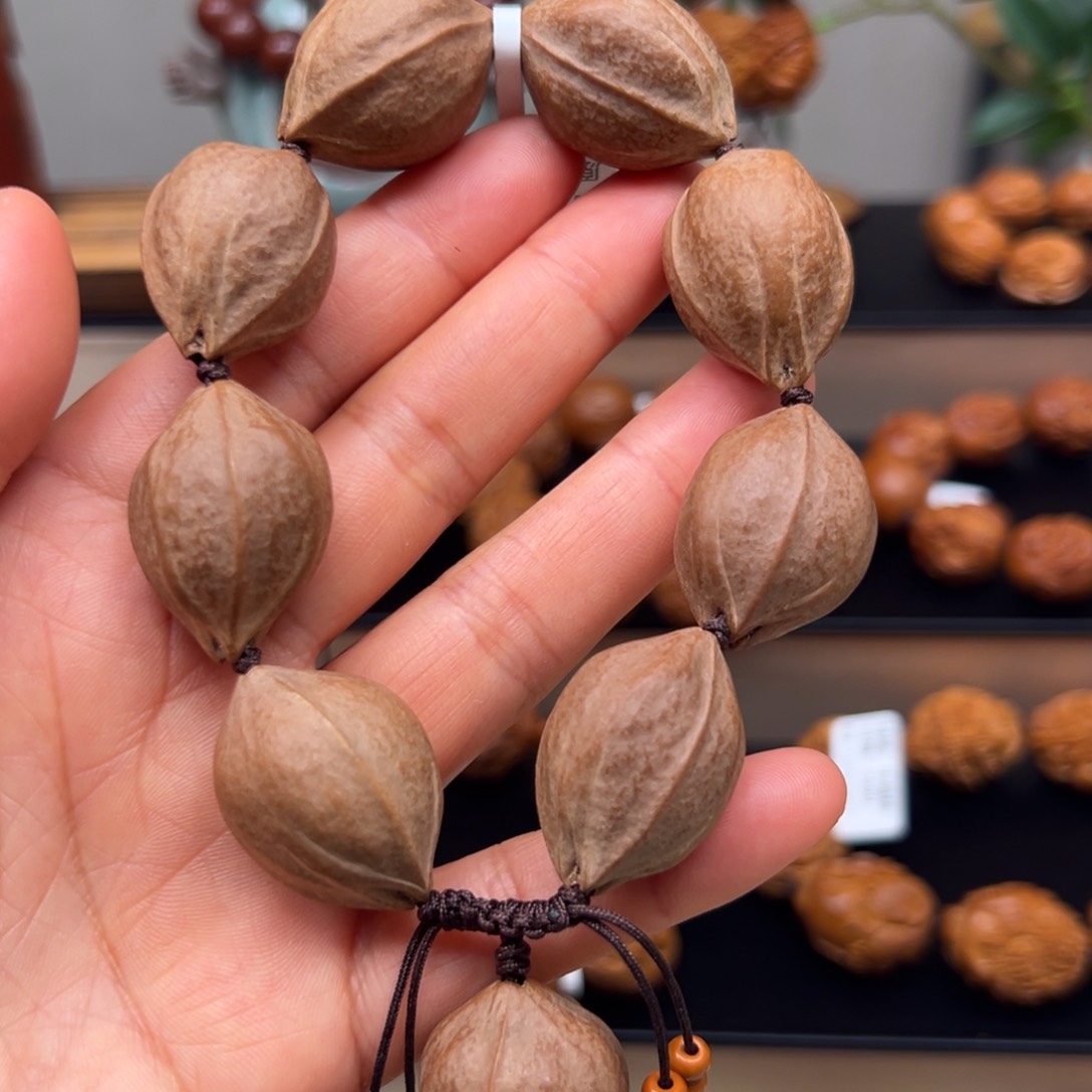 橄榄核吊坠素核手串