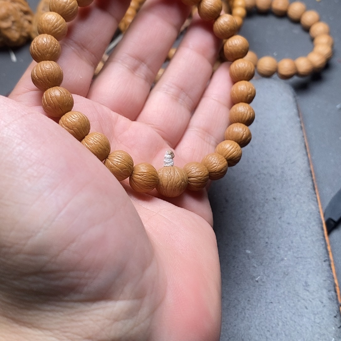 吊坠猴头核桃凤羽