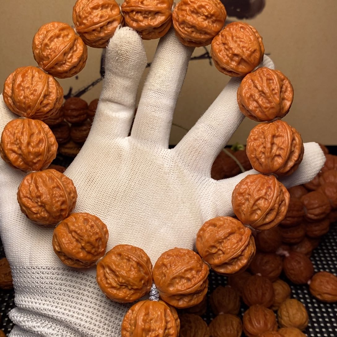 爱***湾文玩核桃吊坠霸王龙手持