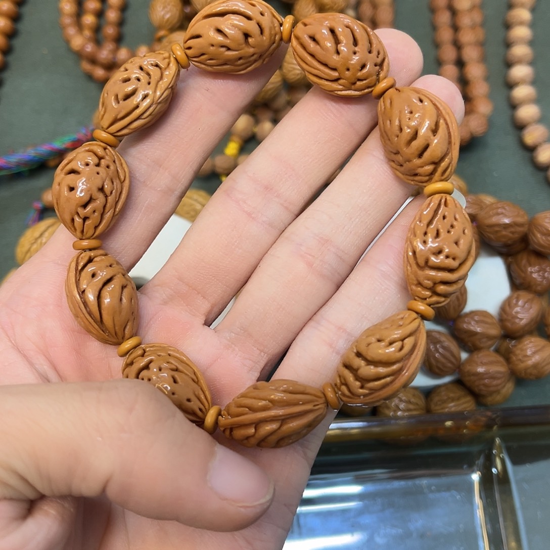 桃核手串野生桃核手串，纯手工打底抛光