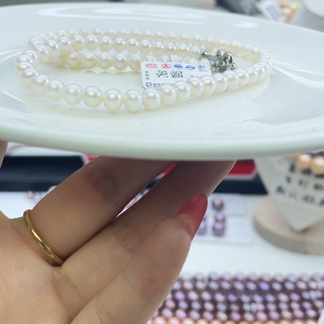淡水珍珠银S925镶嵌耳饰