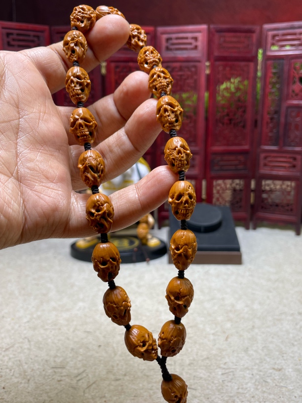 橄榄核雕刻骷髅路路通手持1.23小籽精品