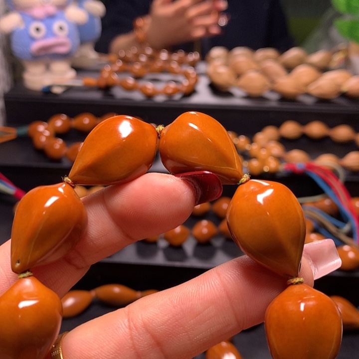 小***包手串/手链橄榄核三花手串