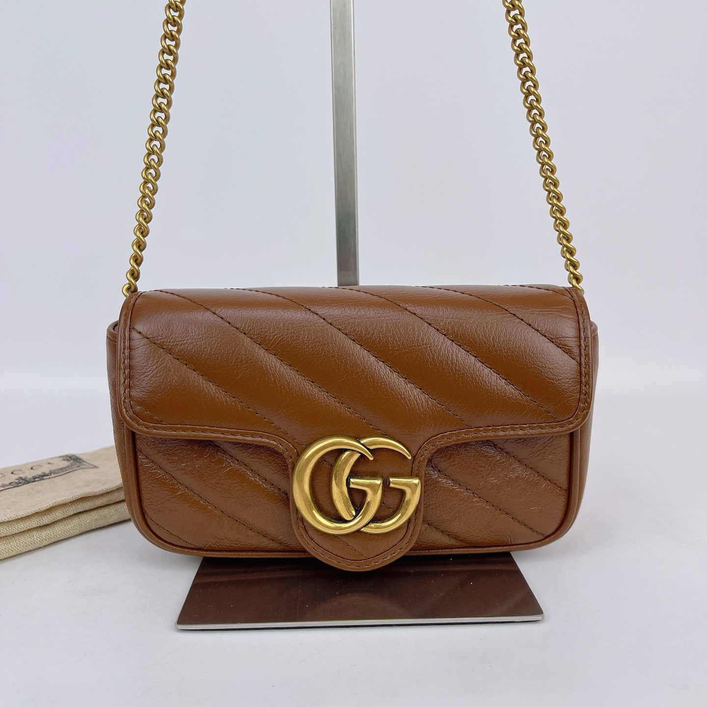 95新 GUCCI/古驰 古驰 焦糖色小号马蒙斜挎包底长16 M559