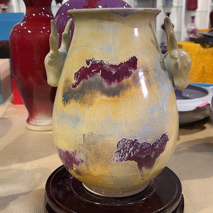 用****0钧瓷的制作方法是将瓷器的表面进行