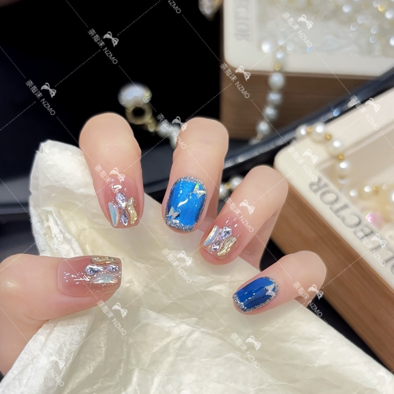 【蓝色星河】克莱因蓝猫眼蝴蝶显白穿戴甲镶钻爆闪美甲