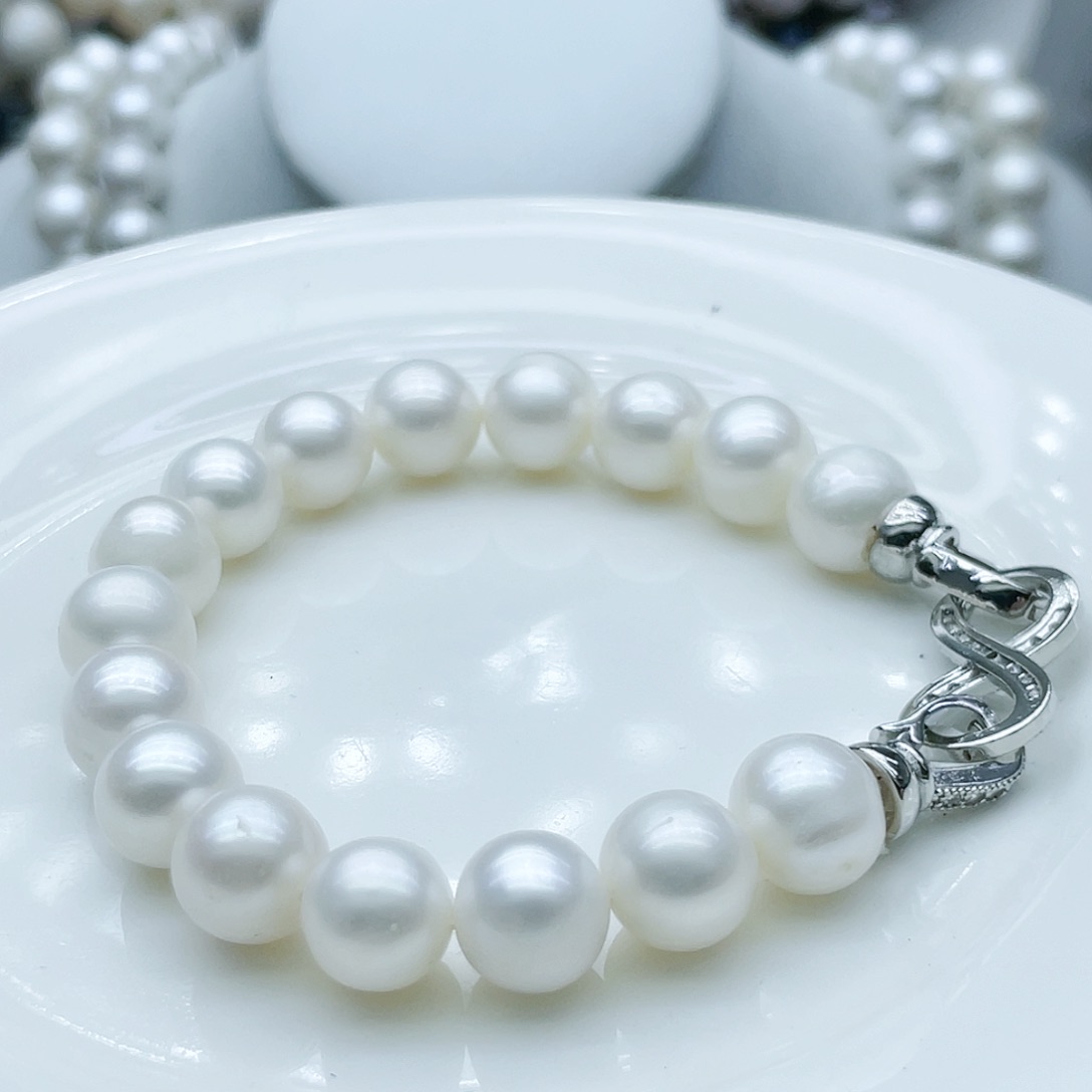 淡水珍珠颈饰钛钢桃*