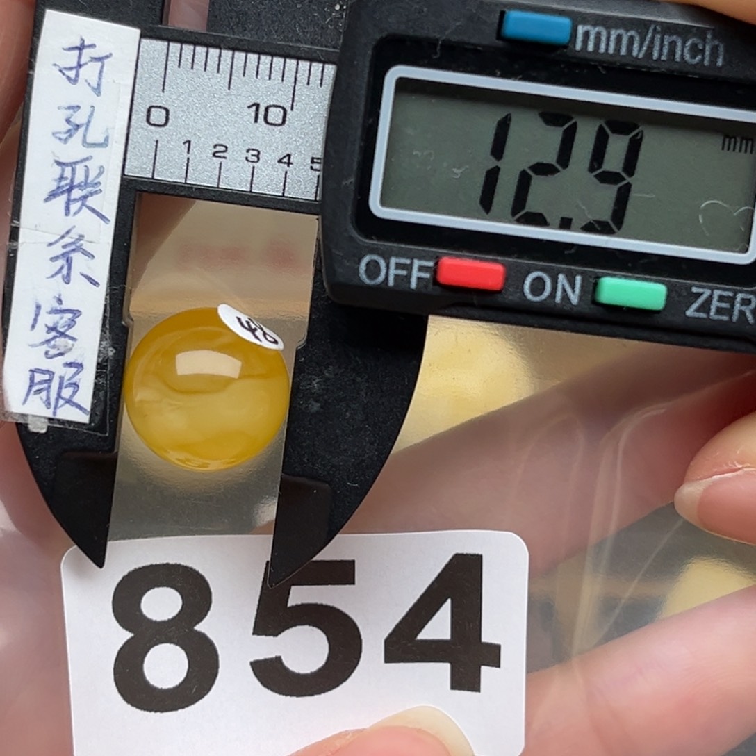 蜜蜡裸石未镶嵌别****?蜜蜡