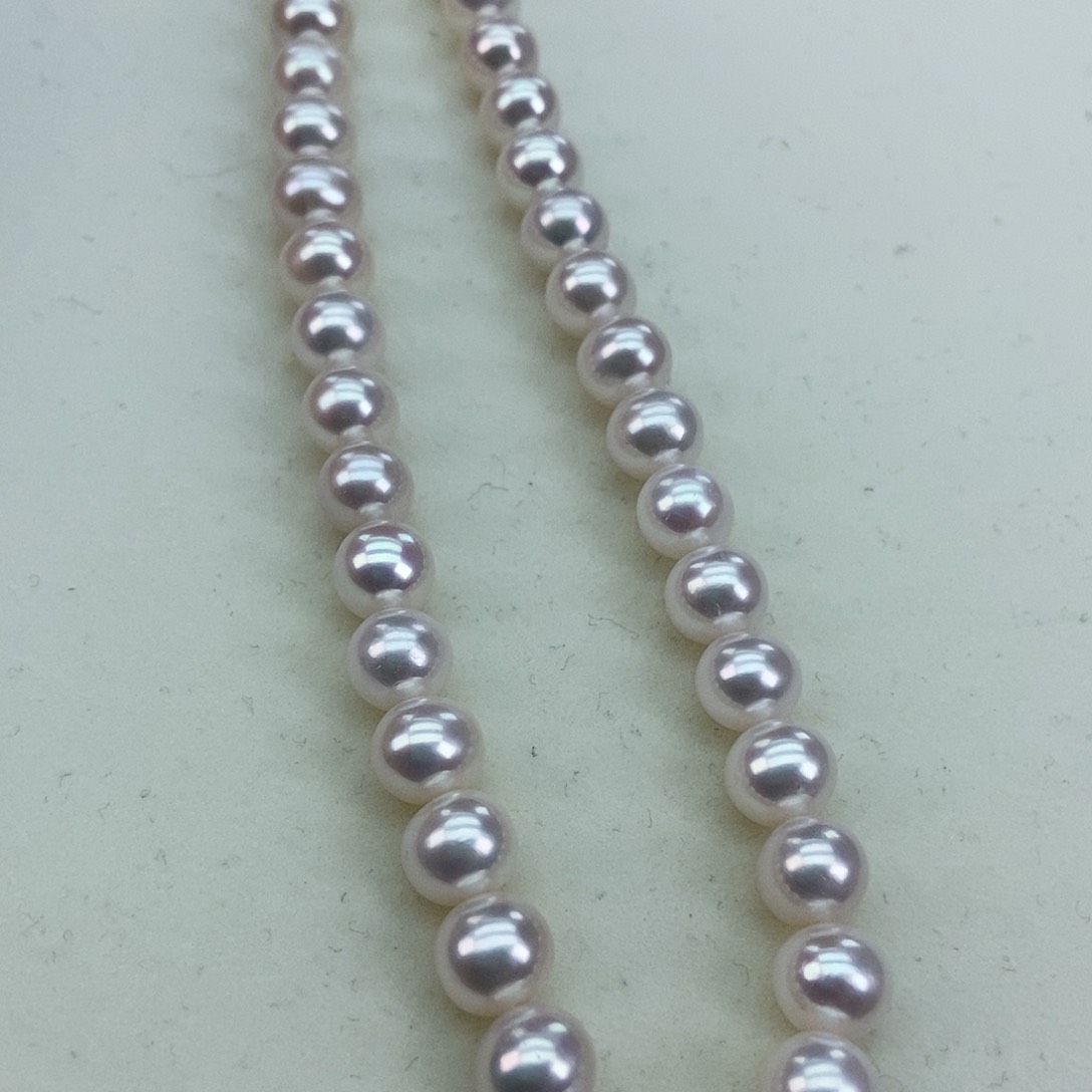 淡水珍珠8-8.5极光炫彩白透粉几乎无暇银S925镶嵌