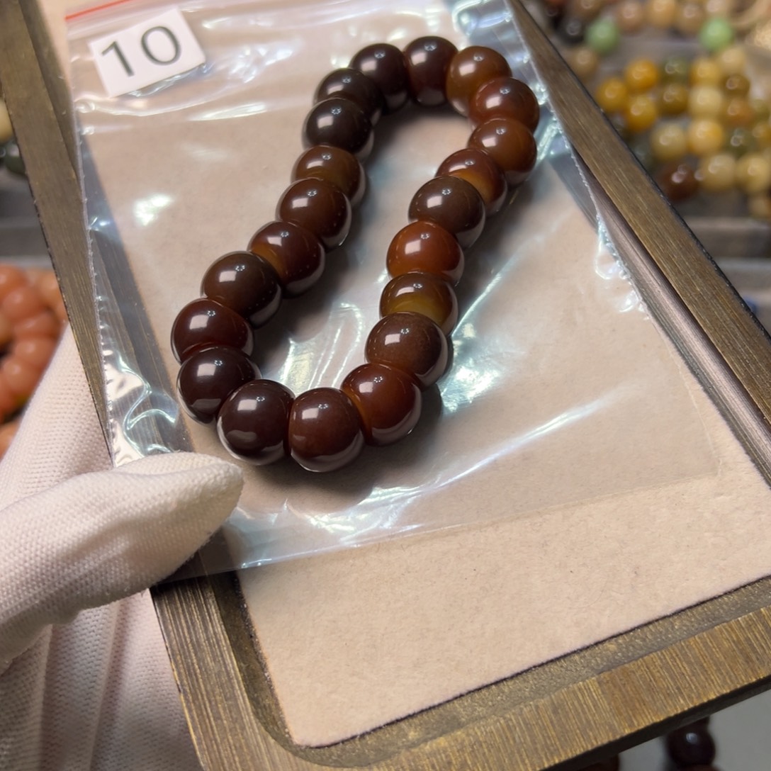 芳***华菩提根/象牙果手串10号菲料巧克力色蒜瓣大肠卡14.8