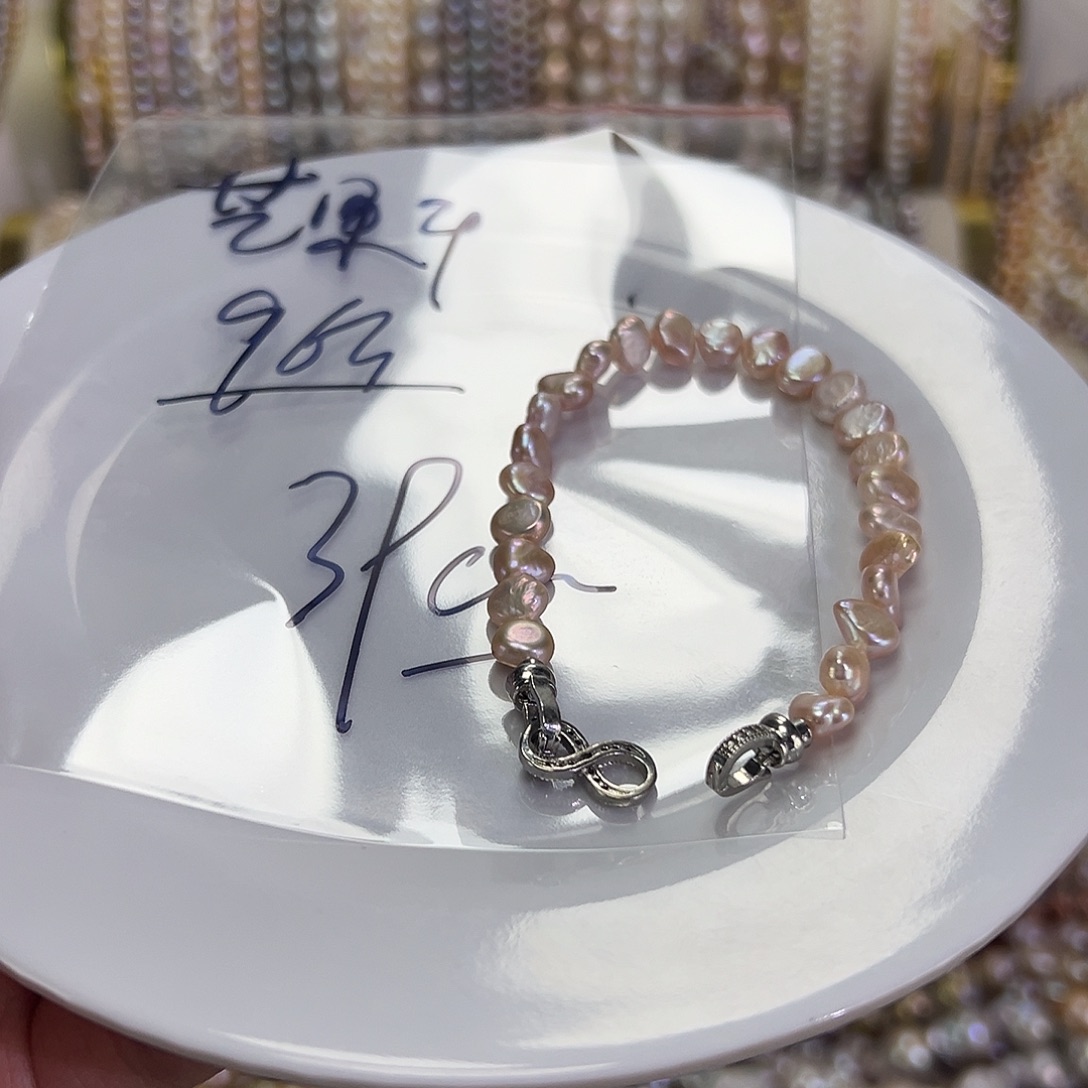 芒***干钛钢淡水珍珠手绳