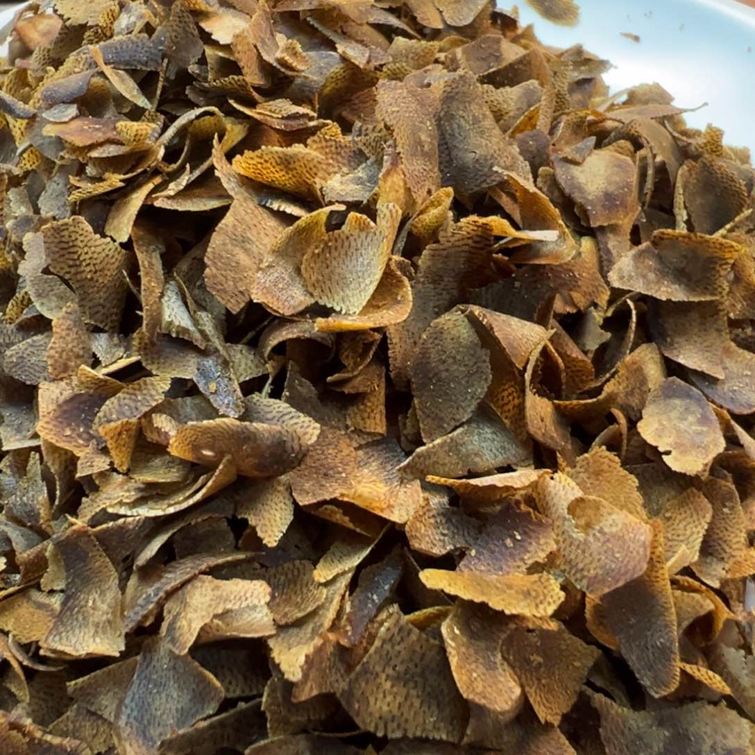 沉香木手把件棋楠白棋金丝透红油切片30克