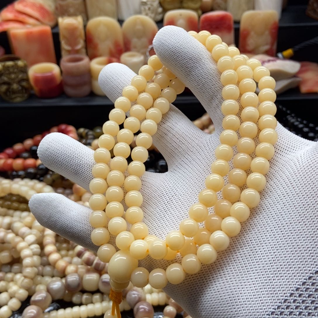 驼骨手串/手链8毫米黄透108