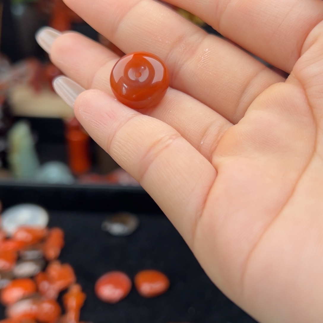 峥***上南红玛瑙未镶嵌平安扣