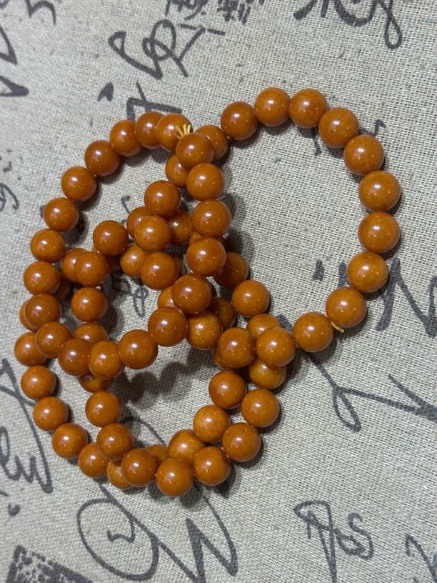 10mm俄料鸡油黄手串多样性发其一