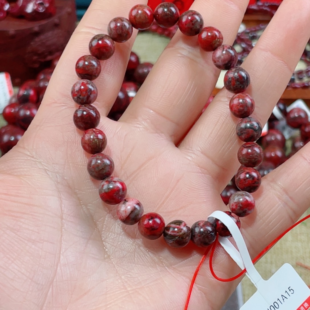 沉***语天然辰砂有沙眼沙坑