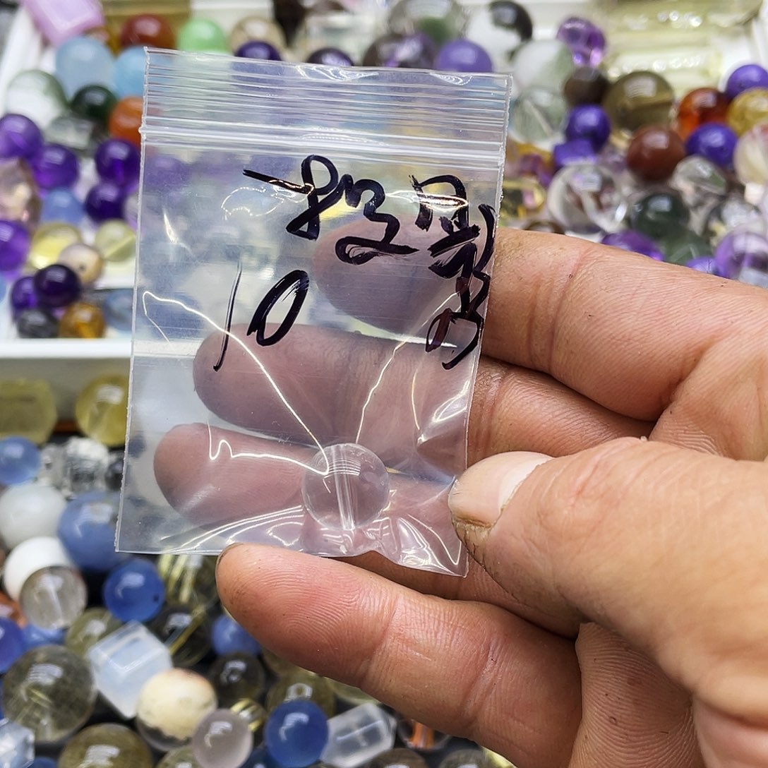 查罗石合金珠宝半成品投***我