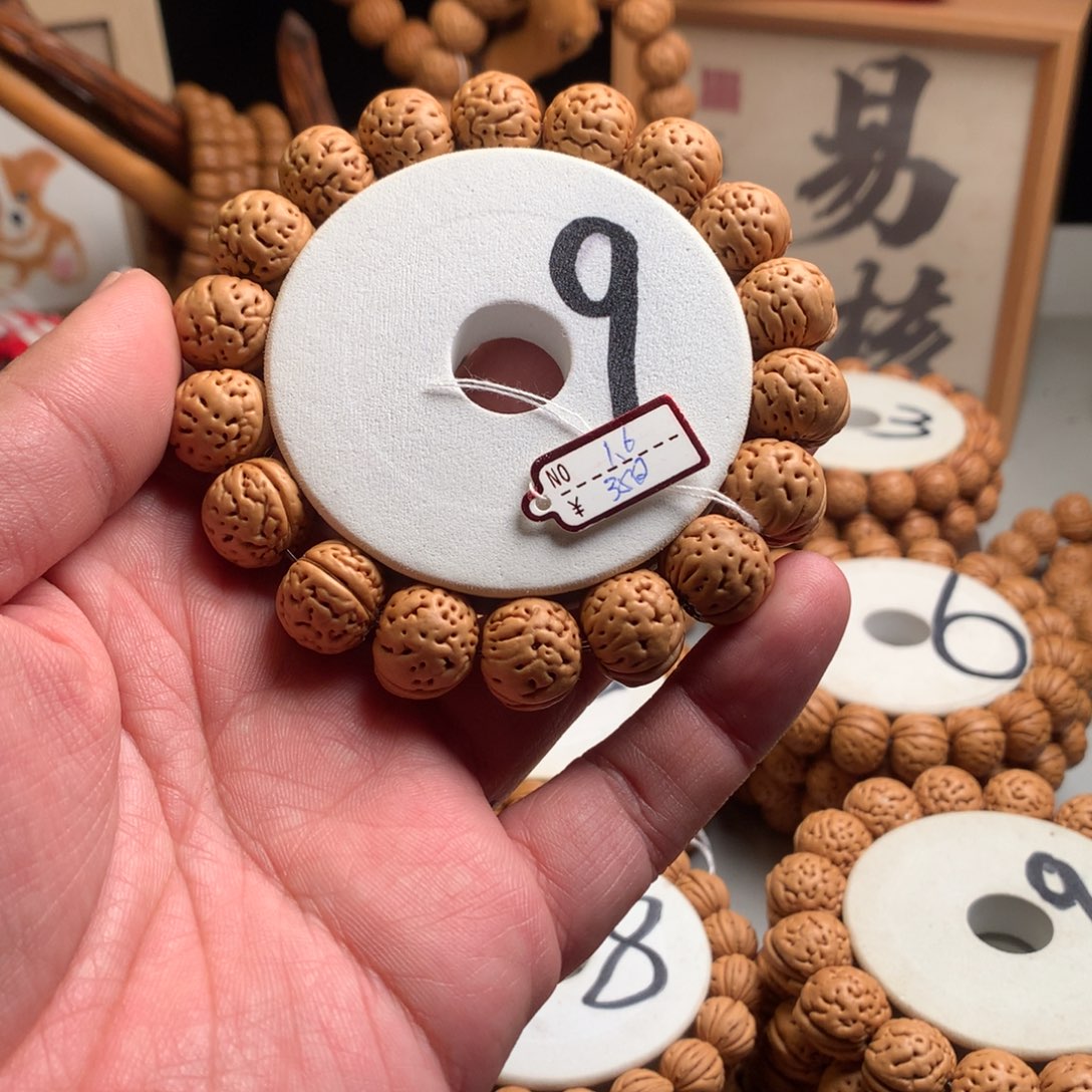 唯***彩桃核手串1.6小馒头手串