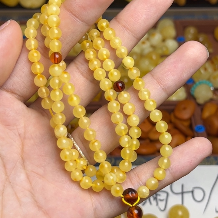 蜜蜡未镶嵌珠宝奇石鸡油黄满蜡俏色108颗卡5+微微瑕