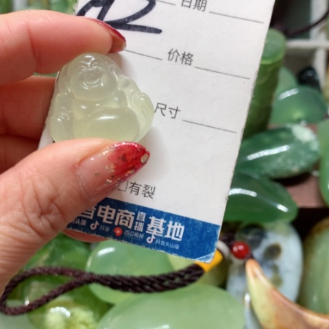 透闪石-蛇纹石玉手把件未镶嵌