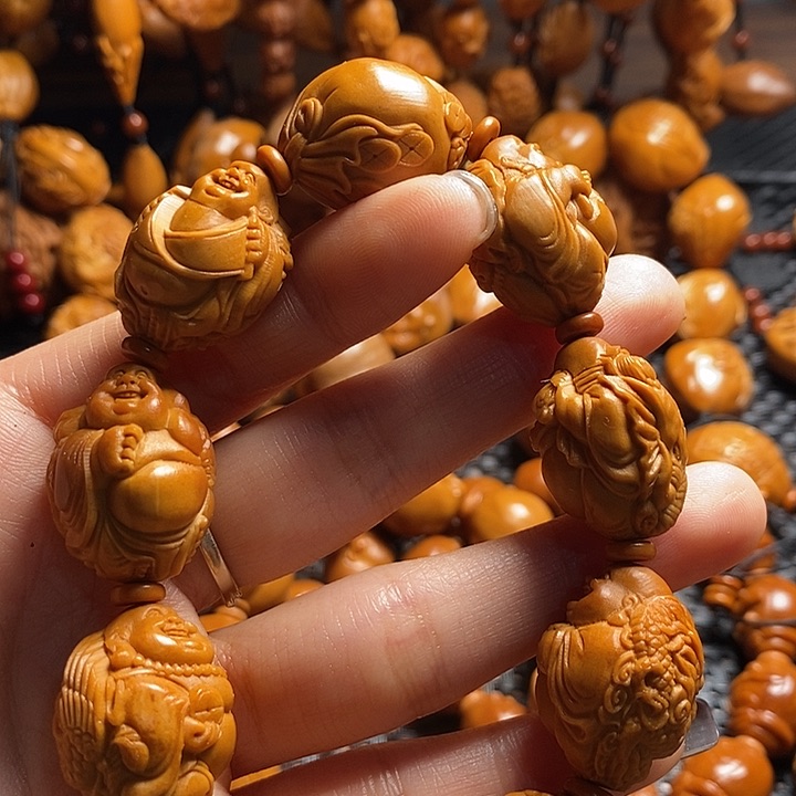 吊坠橄榄核瑞兽弥勒