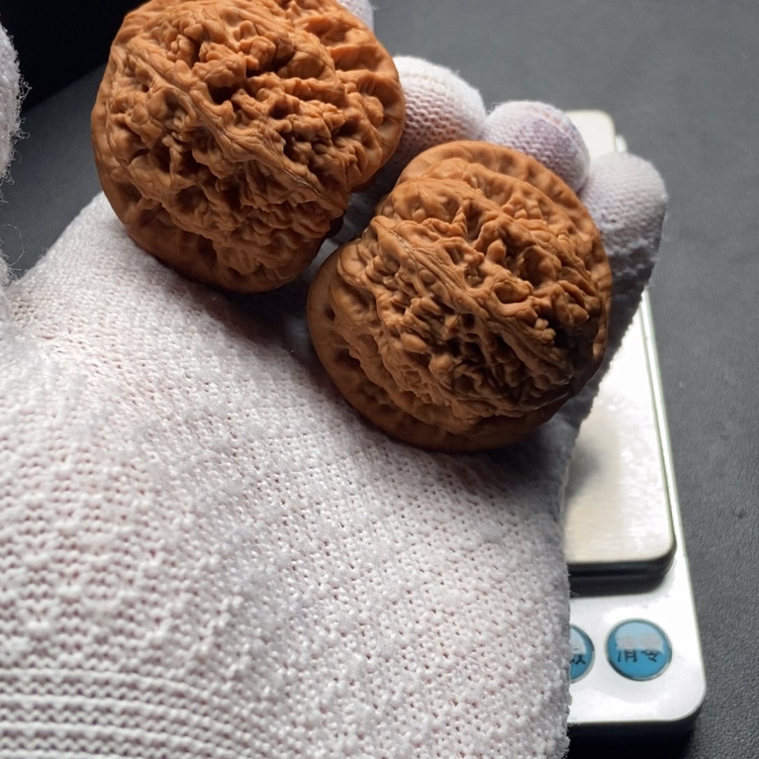 呸***。文玩核桃吊坠大粗筋