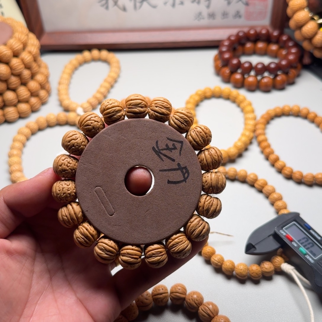 义***店手串桃核老树金丹