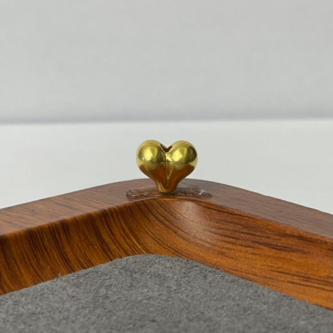 新金社黄金足金999通孔屁桃DP1771