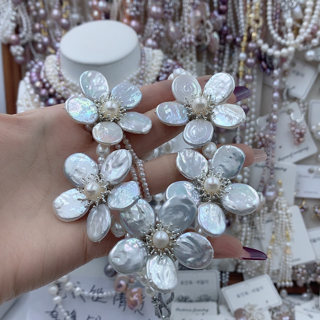 小***啊淡水珍珠银S925镶嵌耳饰