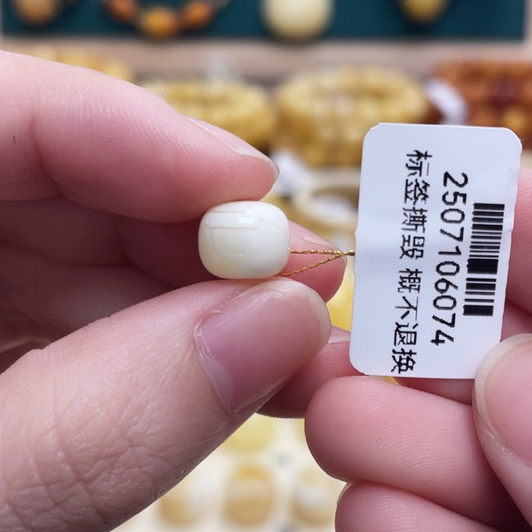 蜜蜡未镶嵌珠宝奇石9.1*7.5mm妖花瓷白老型