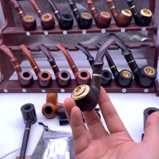 烟斗一经使用不予退换