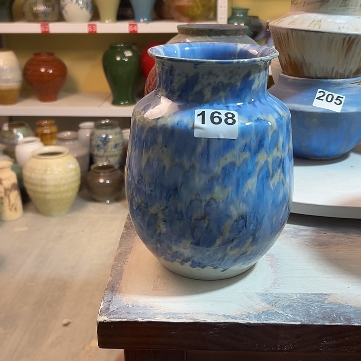 杨***s白泥花瓶高23口10。168